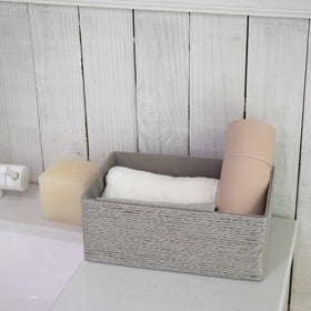 La Jolie Muse gray storage boxes blend with modern decor and reduce clutter.