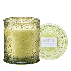 LA JOLIE MUSE Starlit Golden Fir candle jar adds festive ambiance with a clean burn.