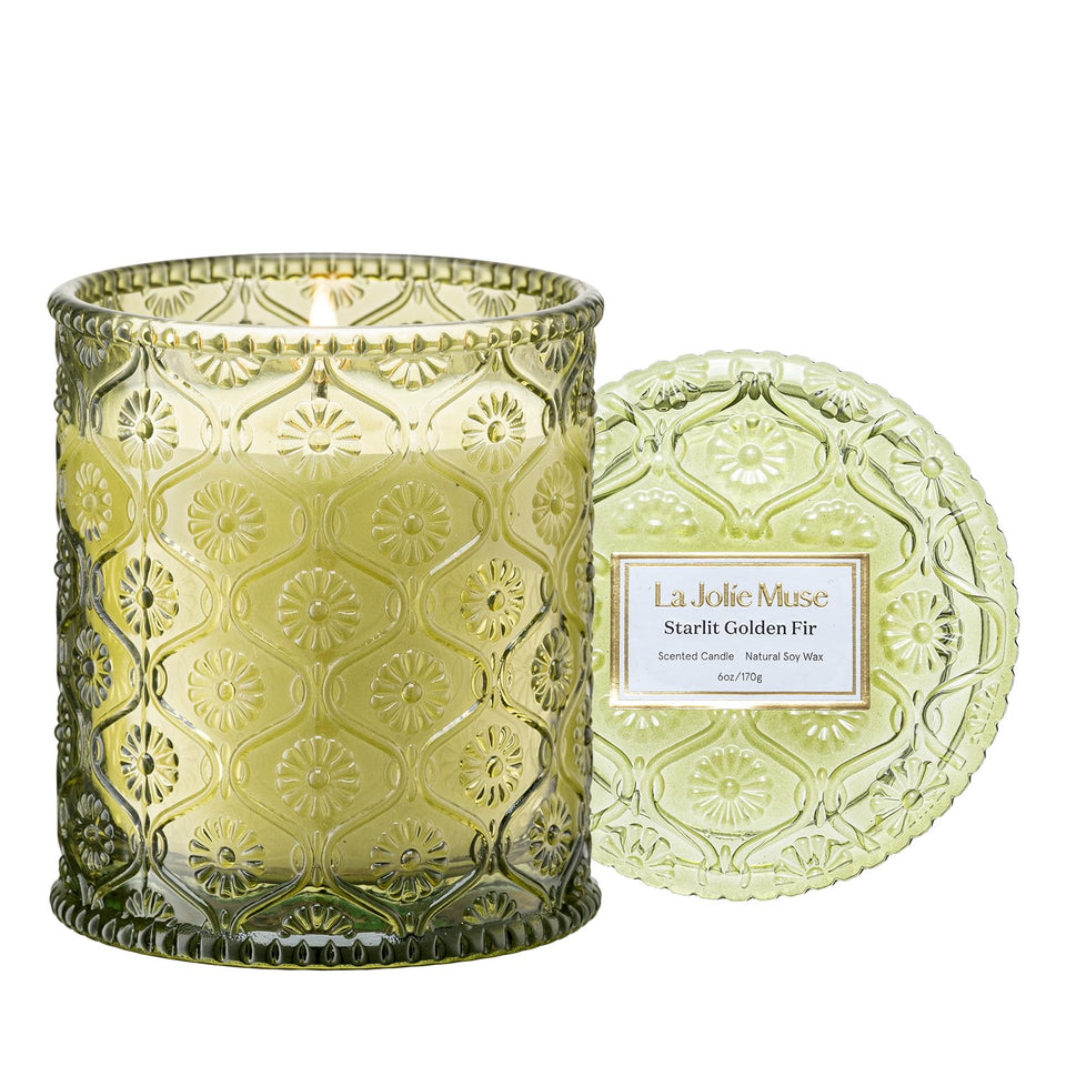 LA JOLIE MUSE Starlit Golden Fir candle jar adds festive ambiance with a clean burn.