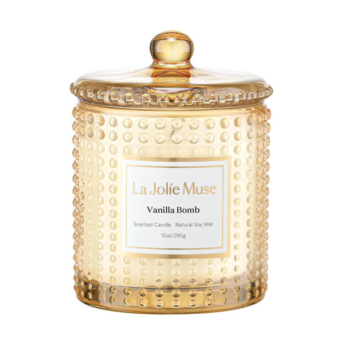 LA JOLIE MUSE Vanilla Bomb candle in hobnail jar for warm, inviting ambiance.