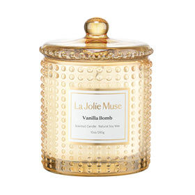 LA JOLIE MUSE Vanilla Bomb candle in hobnail jar for warm, inviting ambiance.