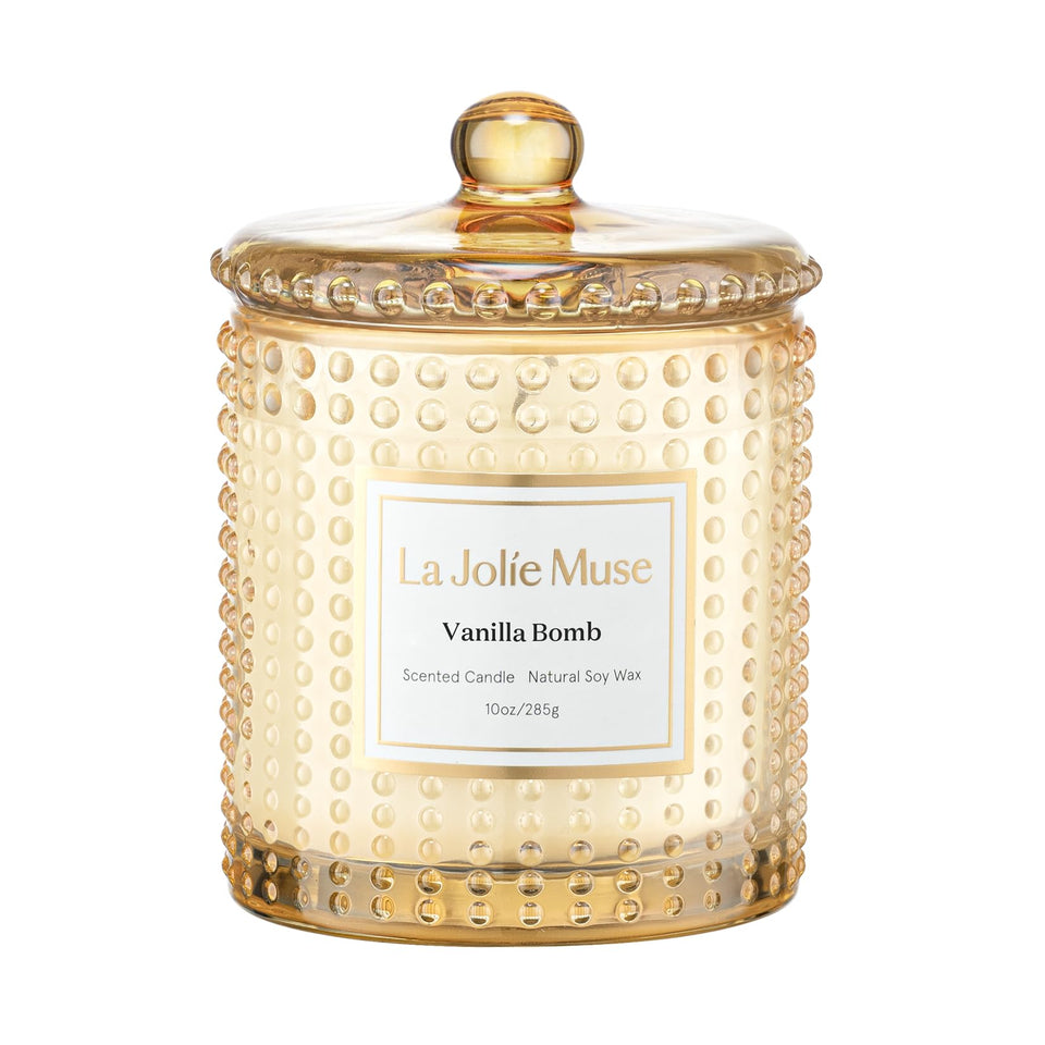 LA JOLIE MUSE Vanilla Bomb candle in hobnail jar for warm, inviting ambiance.