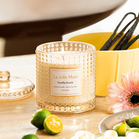 Hobnail glass jar enhances light play for cozy evenings.