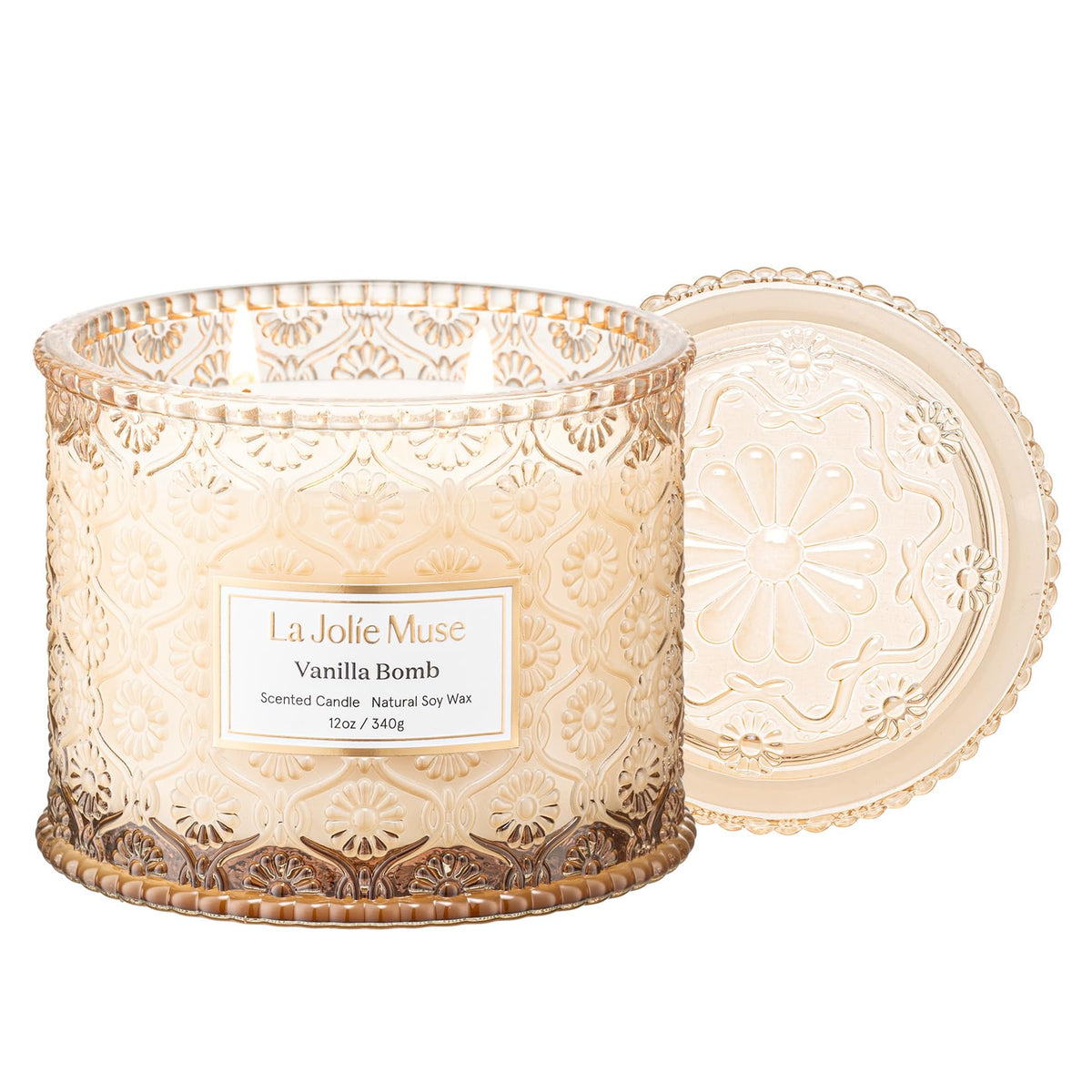 LA JOLIE MUSE Vanilla Bomb candle with embossed daisy jar for cozy, stylish ambiance.