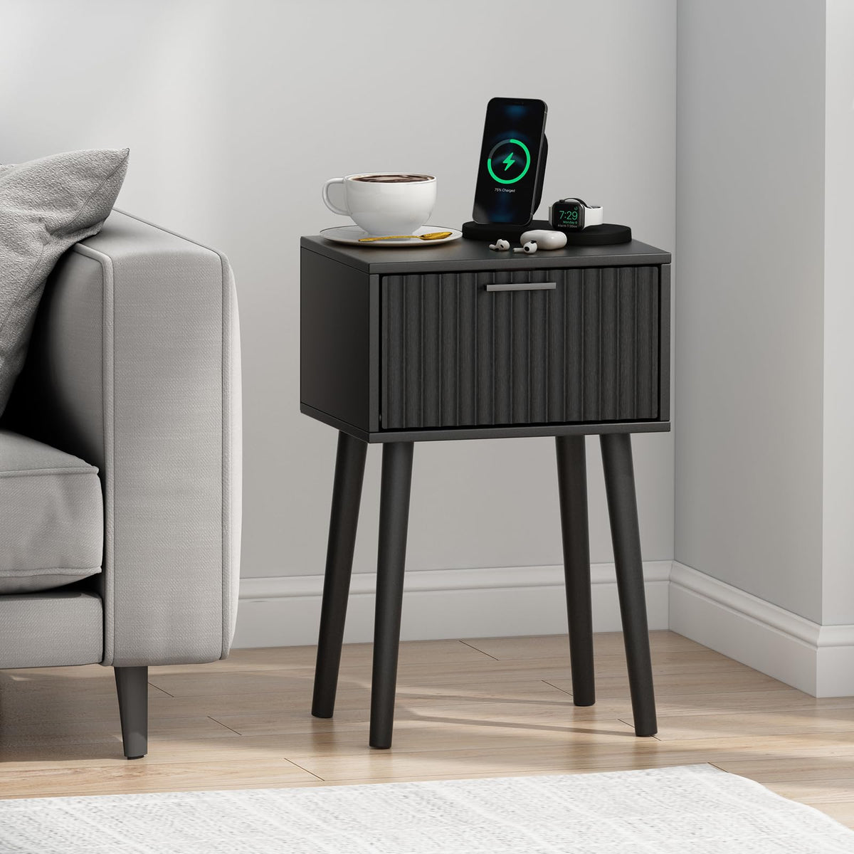 Bedroom scene featuring Laatooree nightstands Set 2 in black beside the bed.