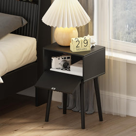Fluted-door storage on Laatooree nightstands conceals items while staying accessible.