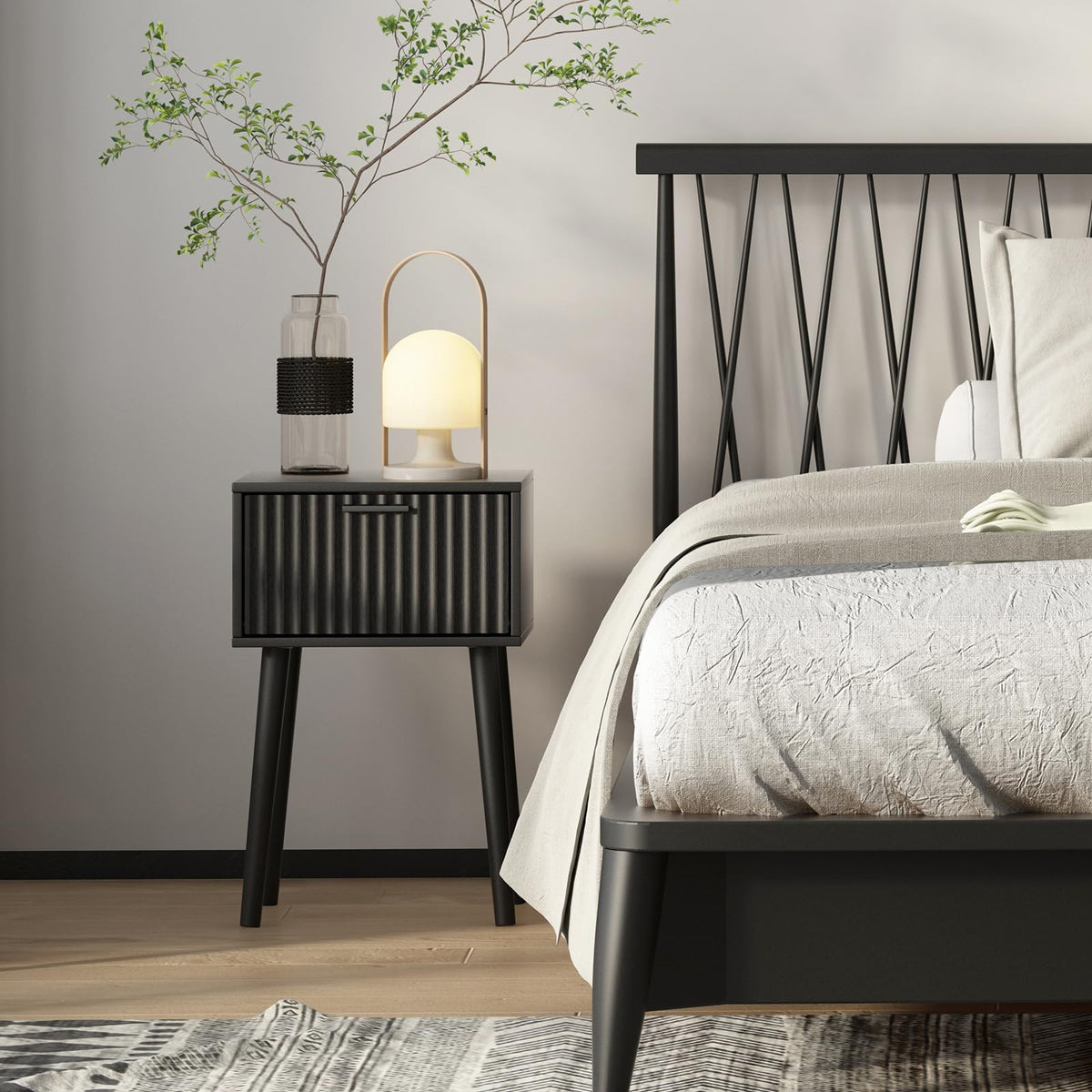Close-up of the tabletop on Laatooree nightstands highlighting compact design.