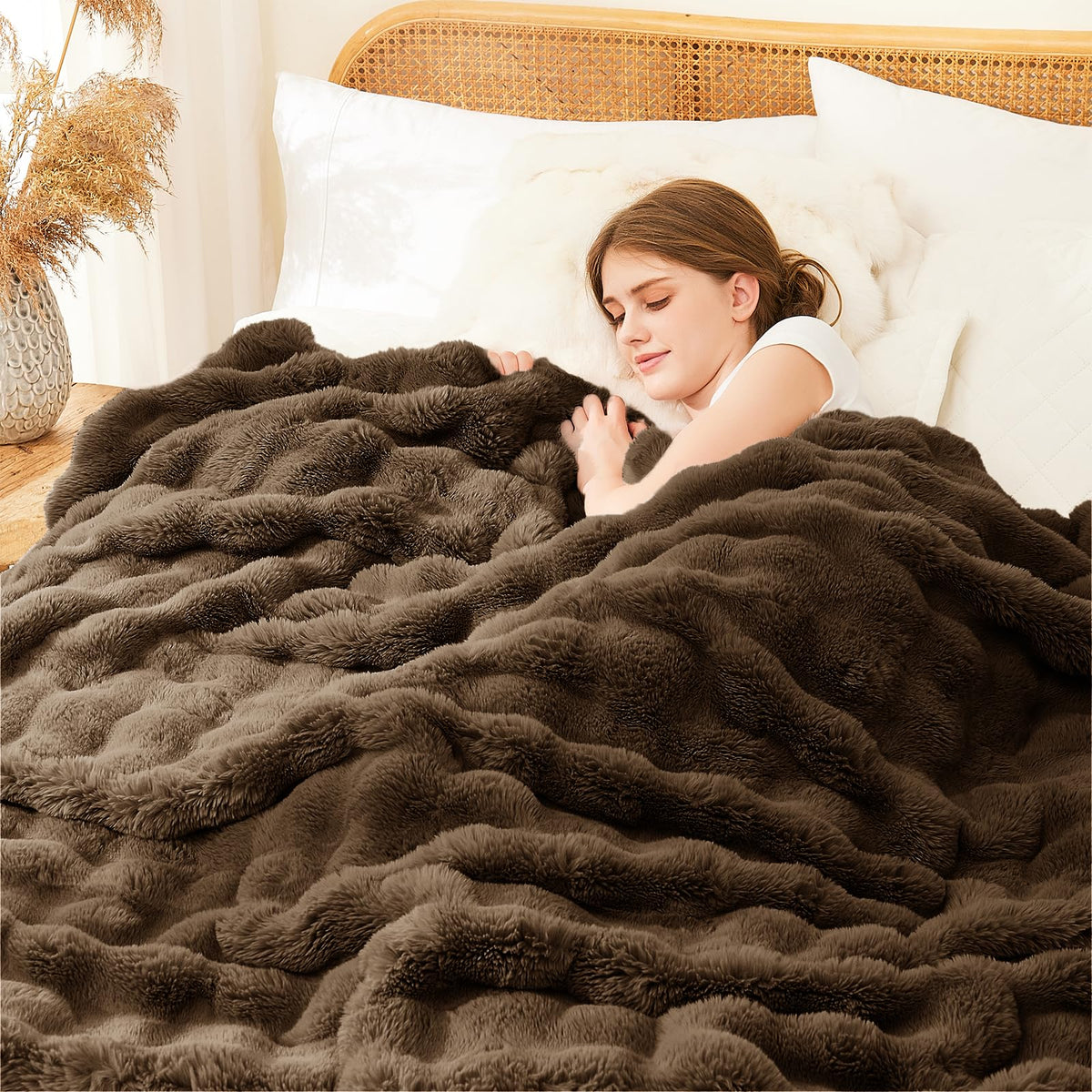 L'AGRATY plush faux rabbit fur blanket offers soft touch for cozy movie nights.