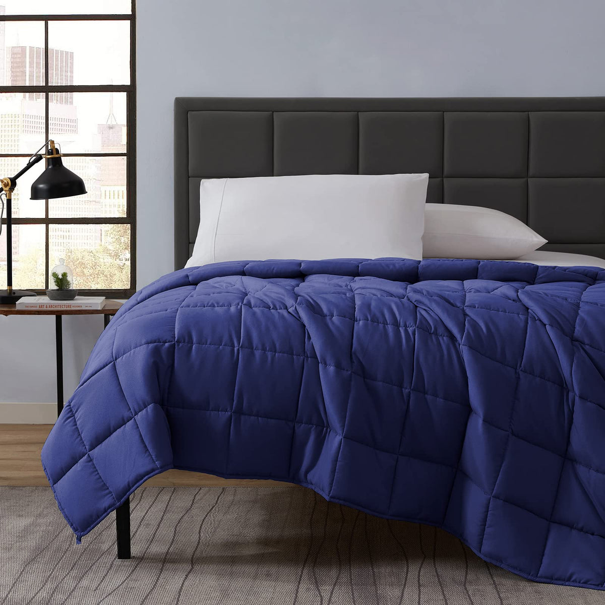 Lagraty weighted blanket on bed, cozy night ready.