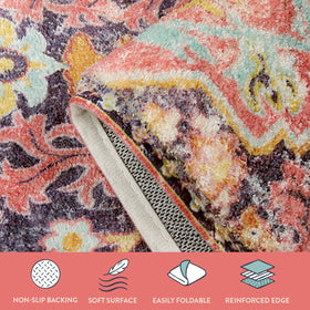 Lahome rug blends fuchsia, yellow stone, and light blue accents