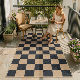 Lahome Colette checkerboard rug outdoor scene, durable and washable for high-traffic patios.