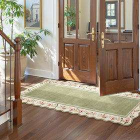 Lahome 2x6 green rug with non-slip backing prevents slips on hard floors.