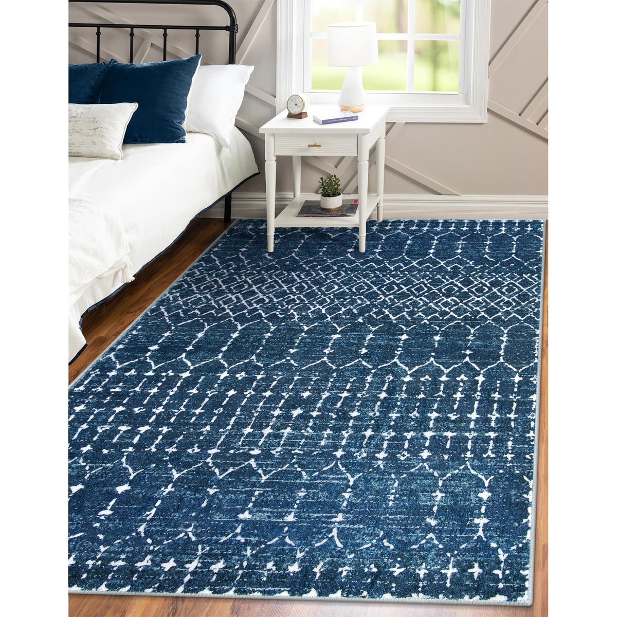 Lahome Moroccan Blue rug in dining area with distressed geometric pattern