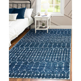 Lahome Moroccan Blue rug in dining area with distressed geometric pattern