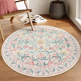 Lahome Sylvie round rug in soft pink with floral pattern, perfect for a cozy bedroom.