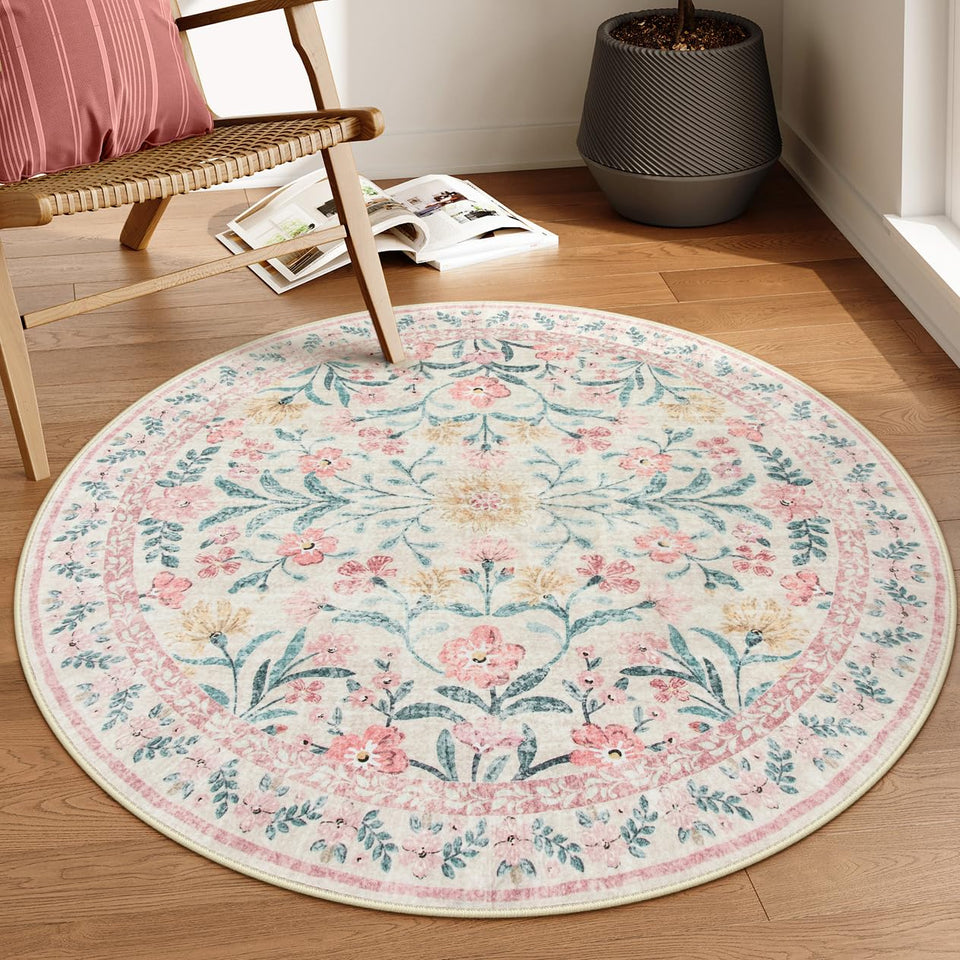 Lahome Sylvie round rug in soft pink with floral pattern, perfect for a cozy bedroom.