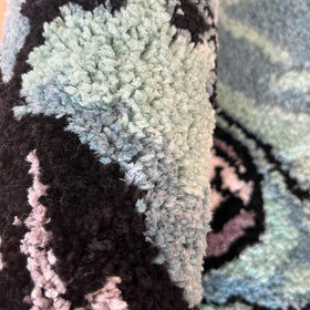 LAKEA geometric flocked texture rug demonstrates irregular shapes for modern decor.