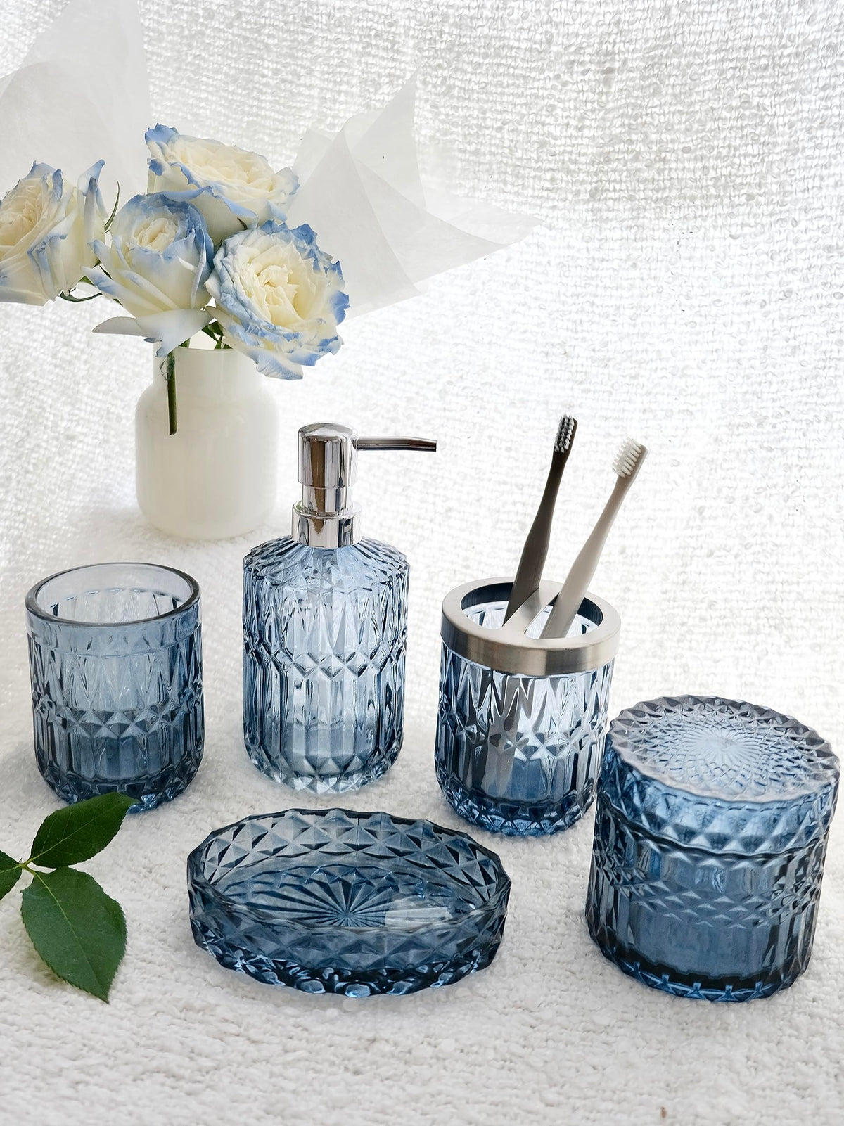 LaMarriti blue cotton swab jar arranges cotton pads compactly.
