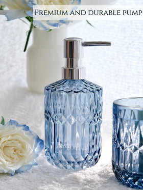LaMarriti blue tumbler neatly stores makeup tools on the sink.