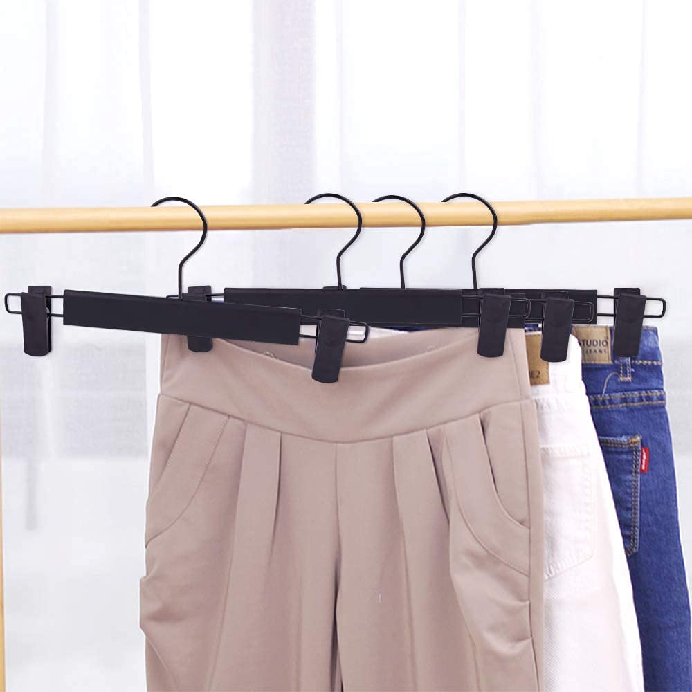 Lamitocs 29x3x13.5 cm hangers fit most garments with clips.