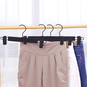 Lamitocs 29x3x13.5 cm hangers fit most garments with clips.