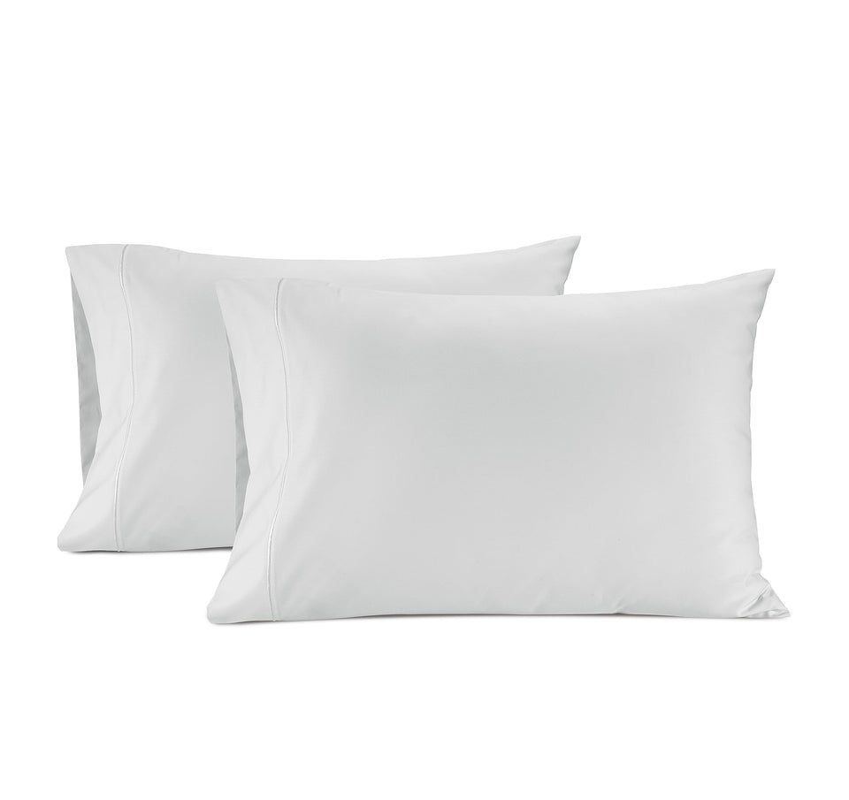 Lane Linen queen pillowcase on bed, showcasing smooth 100% Egyptian cotton.