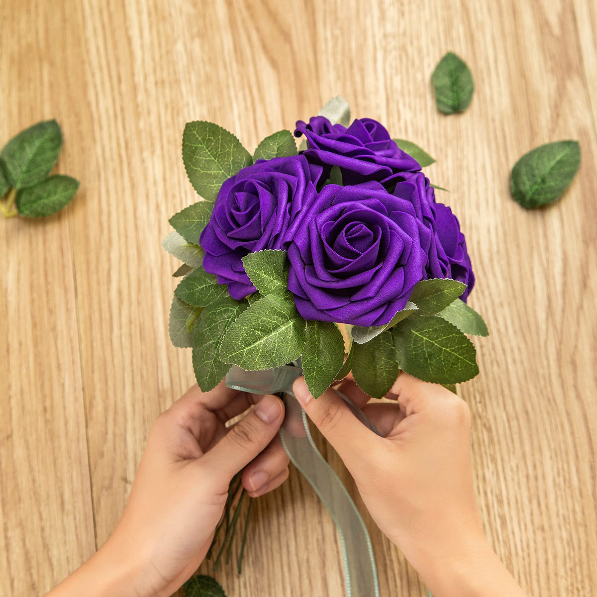 Lansdowns purple foam rose party decor adds color and charm.