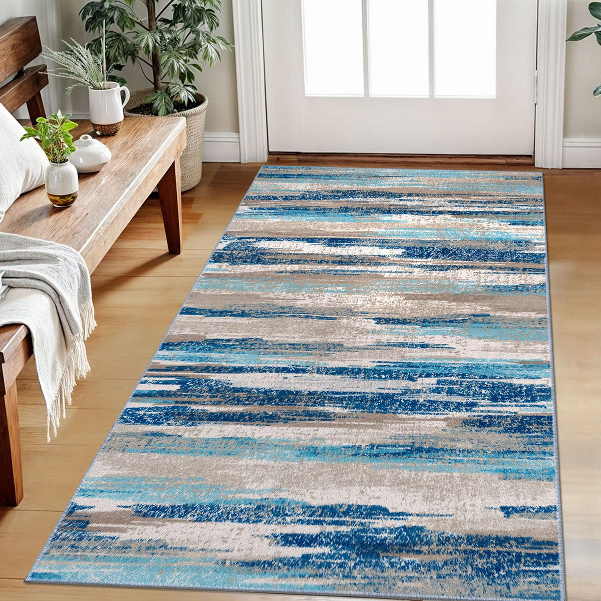Lansny abstract area rug 3x5 blue-ombre for entryways offers a soft, inviting texture.