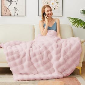 Latepis pink faux fur throw folded display reveals versatile use on sofa or bed.