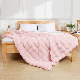 Latepis pink faux fur throw soft couch scene emphasizes warmth and comfort.