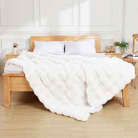 Latepis White Throw Blanket adds living room style with soft warmth and texture.