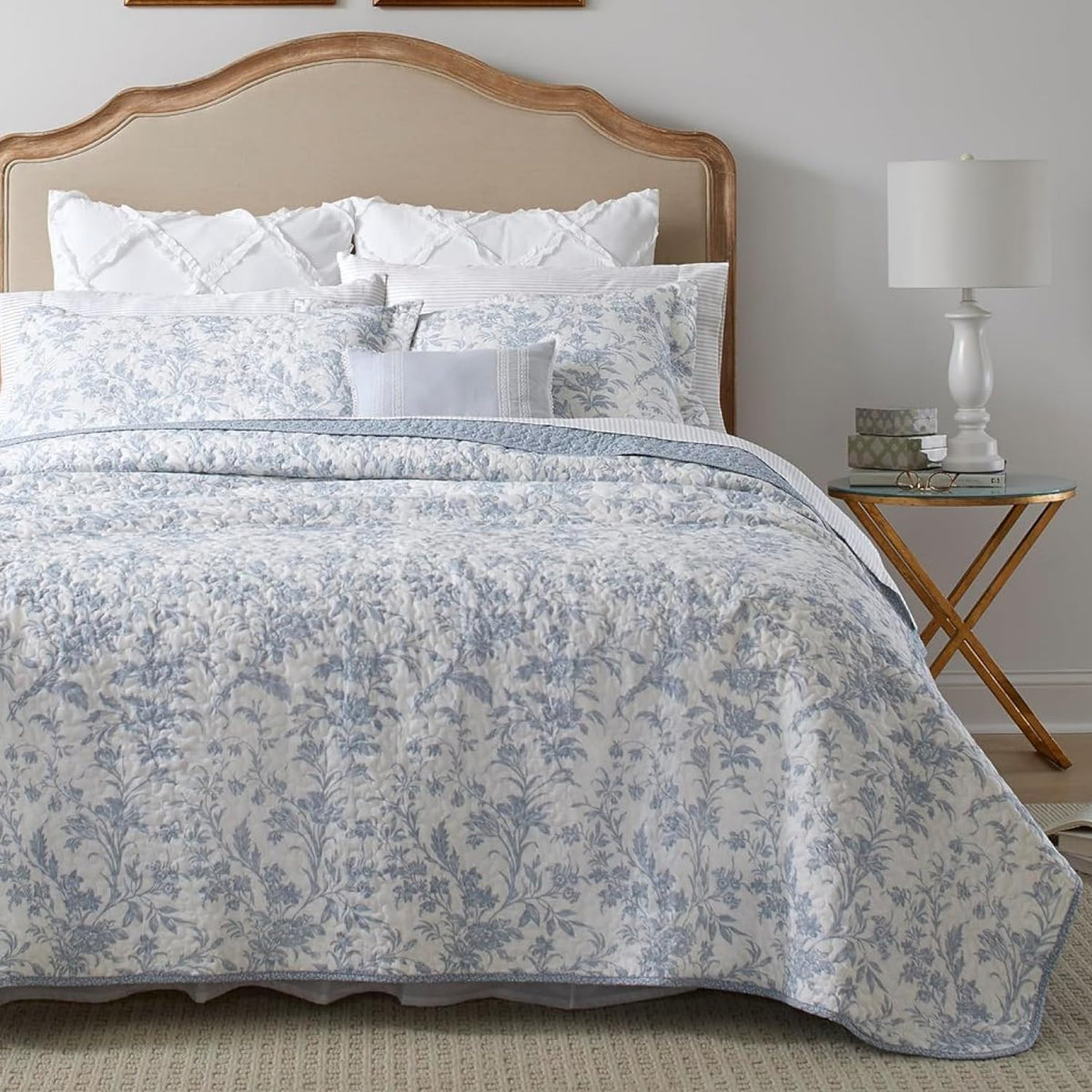 Laura Ashley Amberley Blue king quilt on bed showing reversible design and soft cotton comfort
