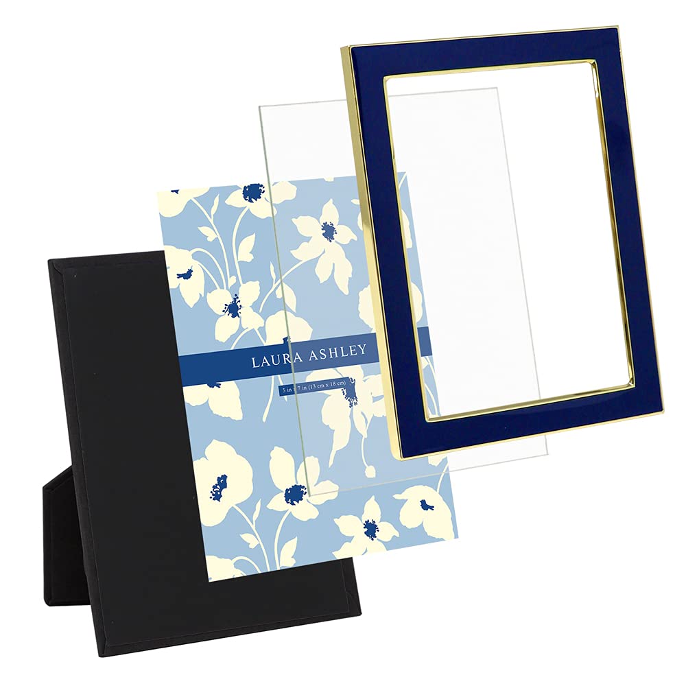 Laura Ashley frame with soft fabric backing simplifies photo changes.