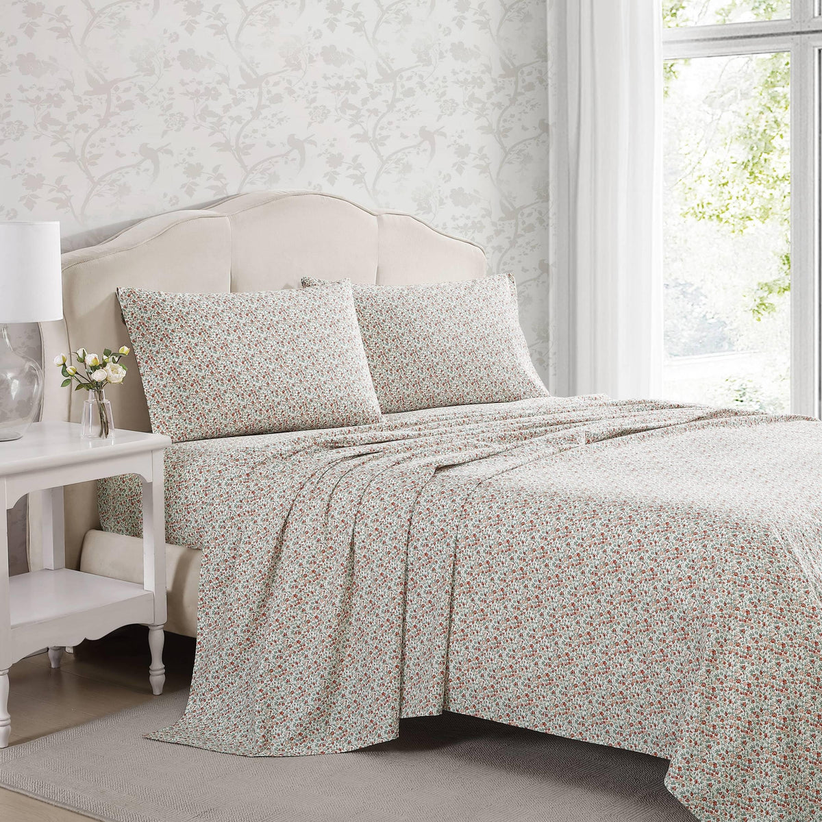 Close-up of percale cotton texture on Laura Ashley Emogene Burnt Orange king sheets