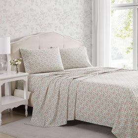 Close-up of percale cotton texture on Laura Ashley Emogene Burnt Orange king sheets