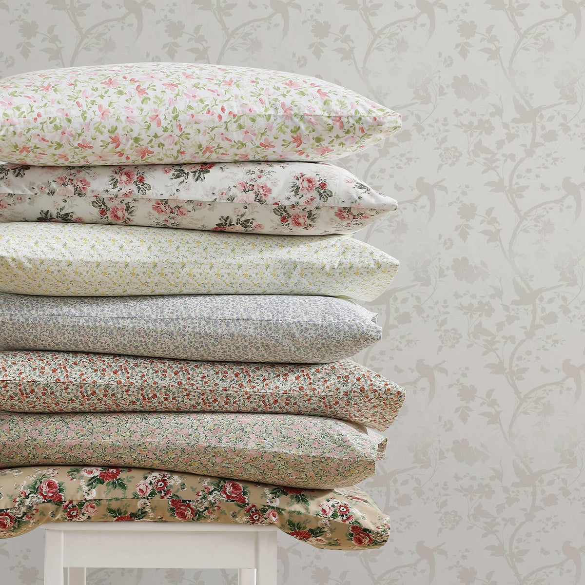 Full Laura Ashley Emogene Burnt Orange king sheet set displayed on a bed