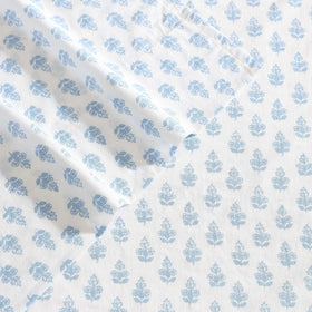 Laura Ashley Francesca Blue floral sheet set laid flat for full coverage.