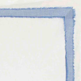 Stacked bedding featuring Mila Blue Euro Sham creates a cohesive, refined bedscape.