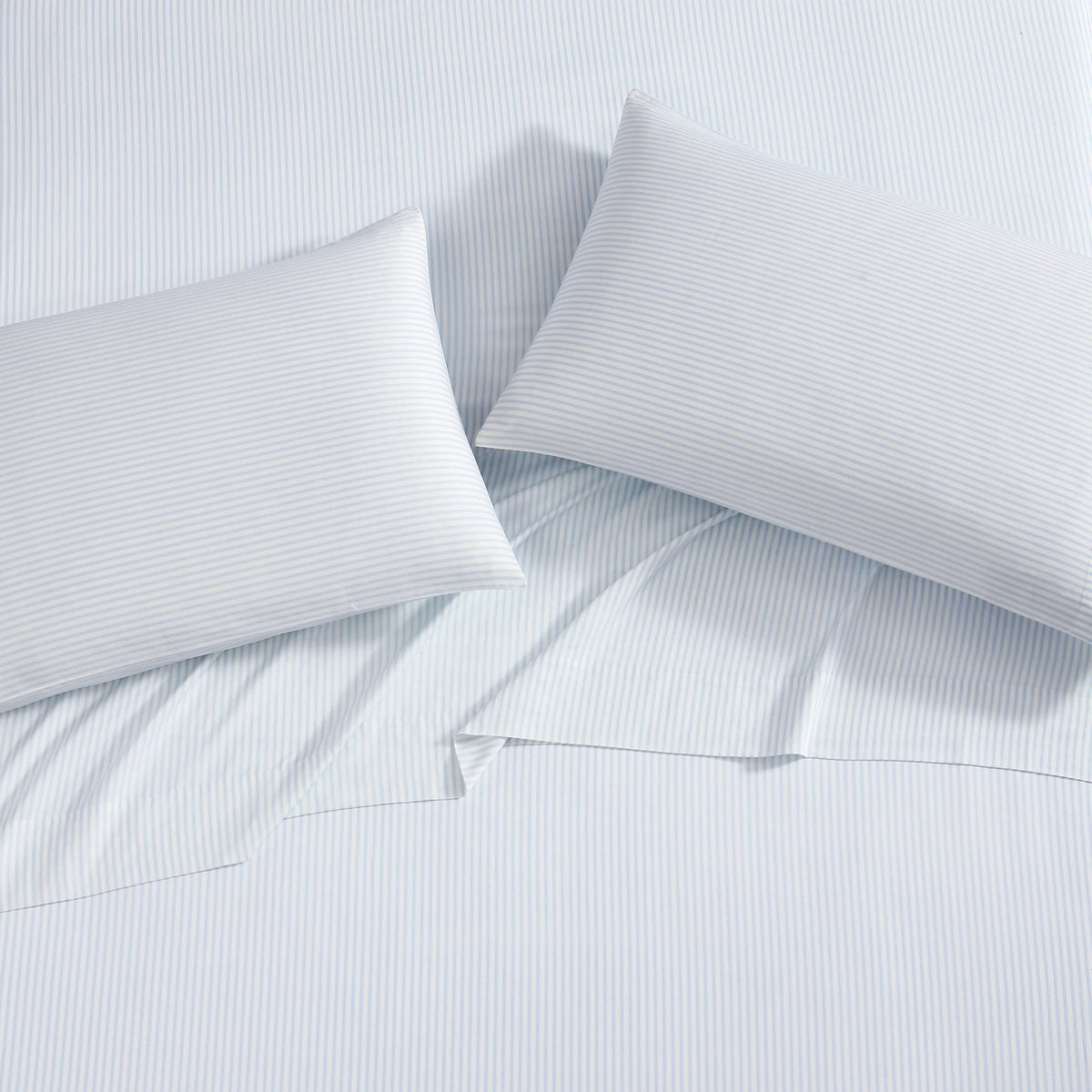 Close-up of Laura Ashley Ramona Blue pillowcase showing silky finish.