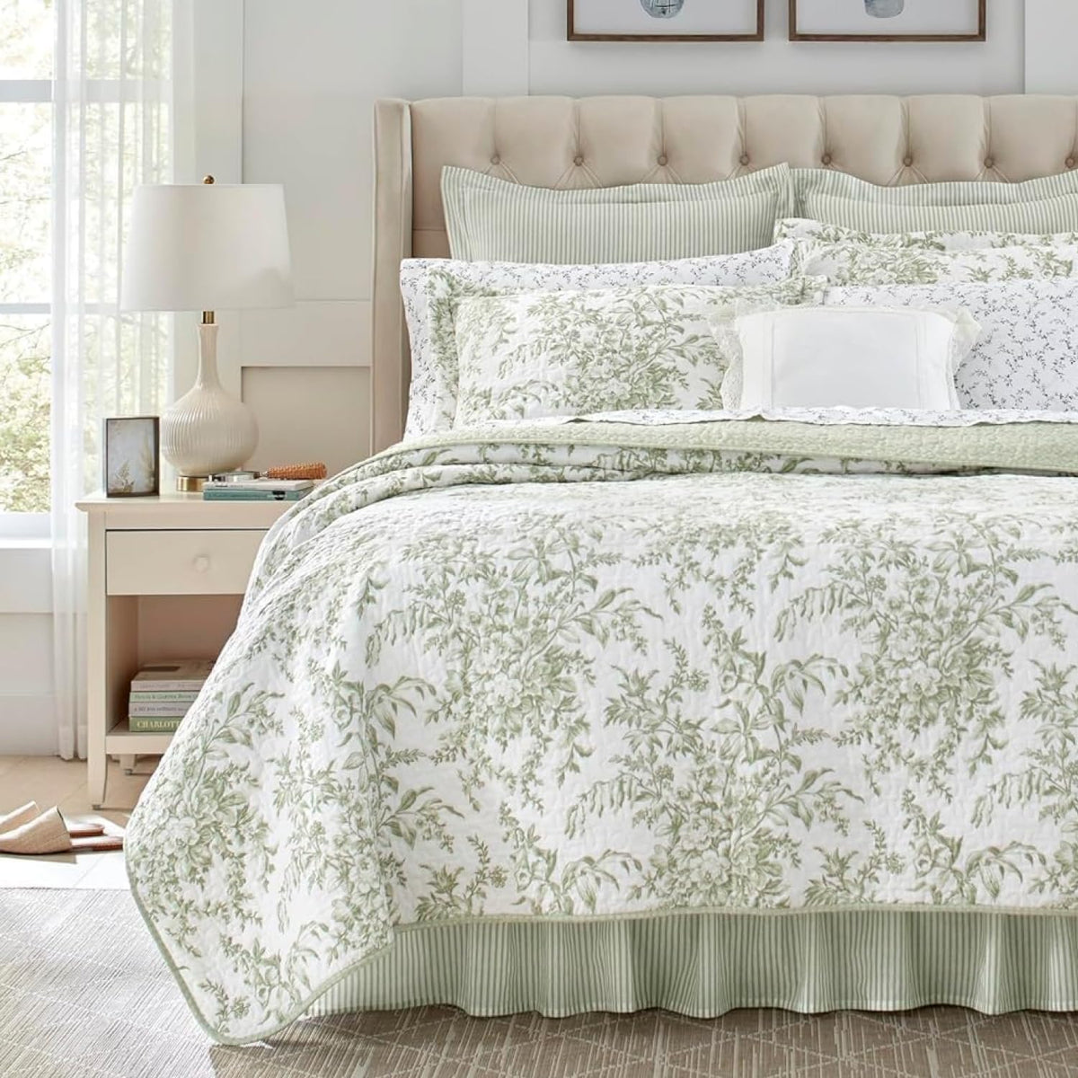 Laura Ashley Queen Quilt Set in Bedford Green, front view with soft floral bedding