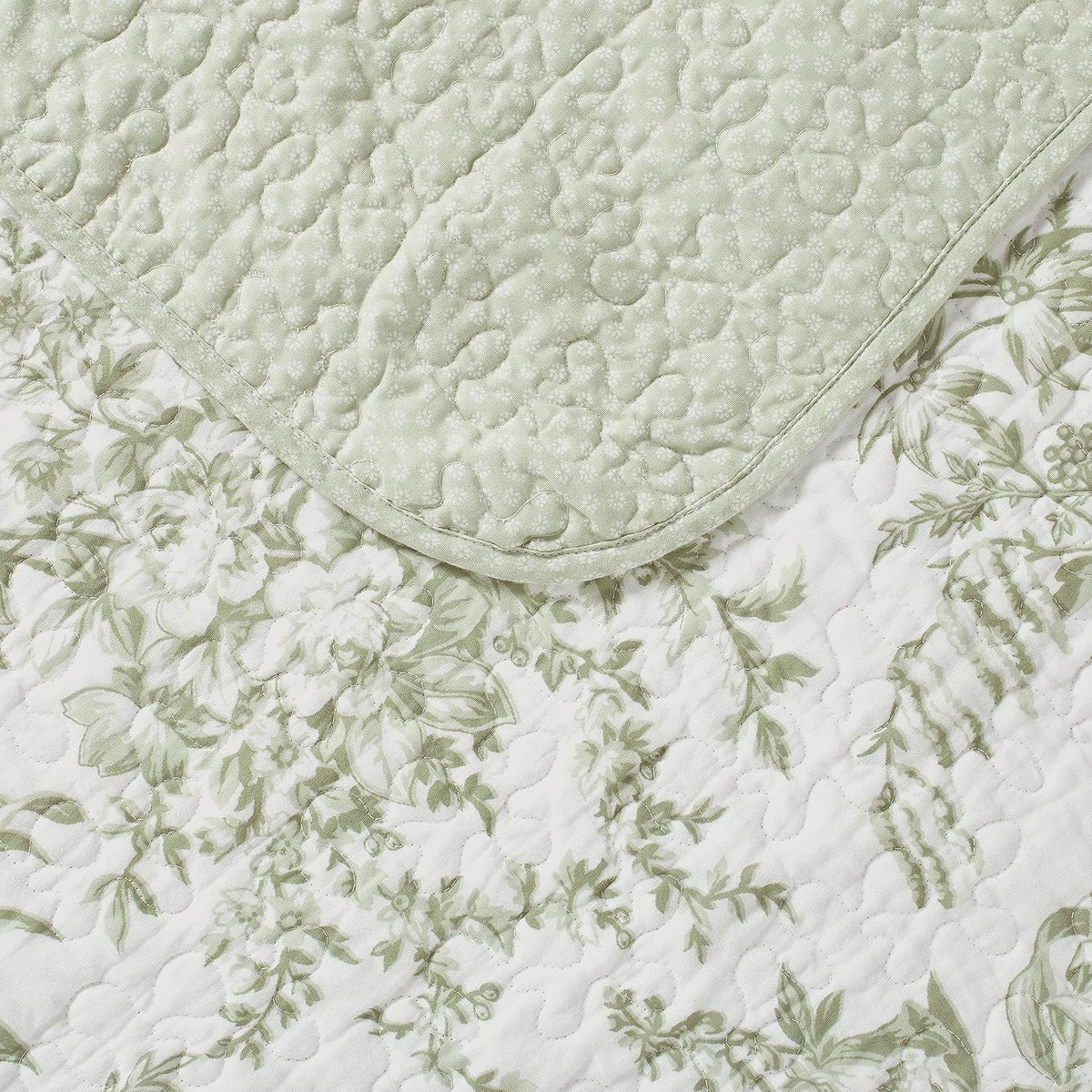 Visible stitching and durable finish on the Laura Ashley quilt
