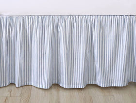 Laura Ashley bedskirt with 14.5-inch drop covers bed base and under-bed storage.