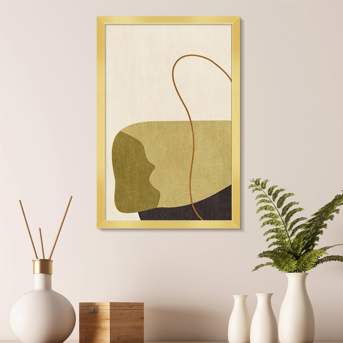 LaVie Home gold frame mounted for vertical wall display.