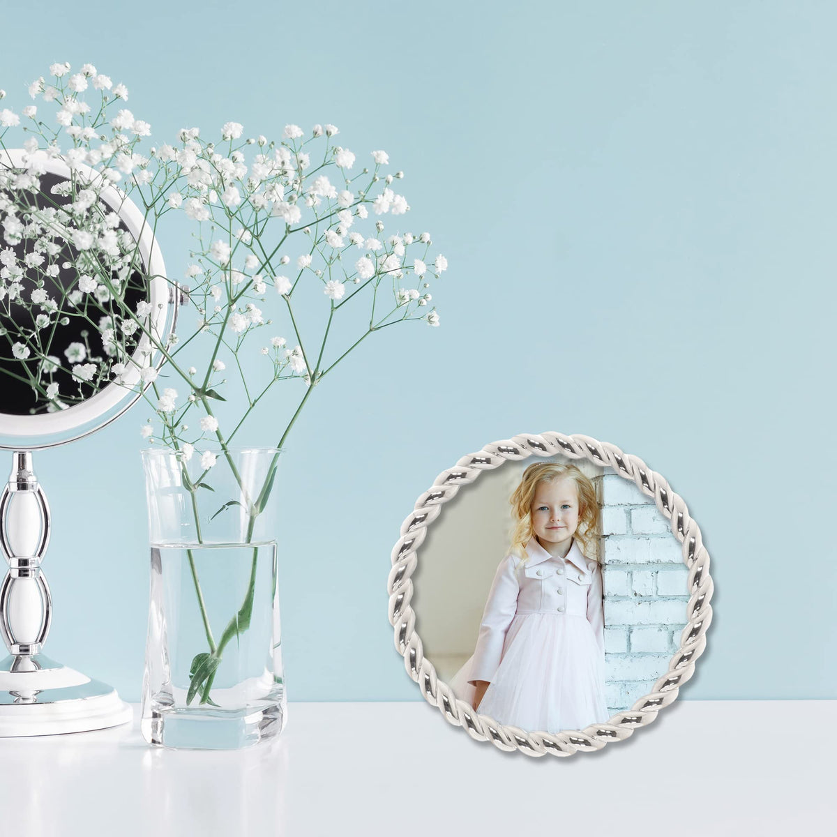 Lawrence Frames Rope Design Metal Frame round silver easel display on a shelf