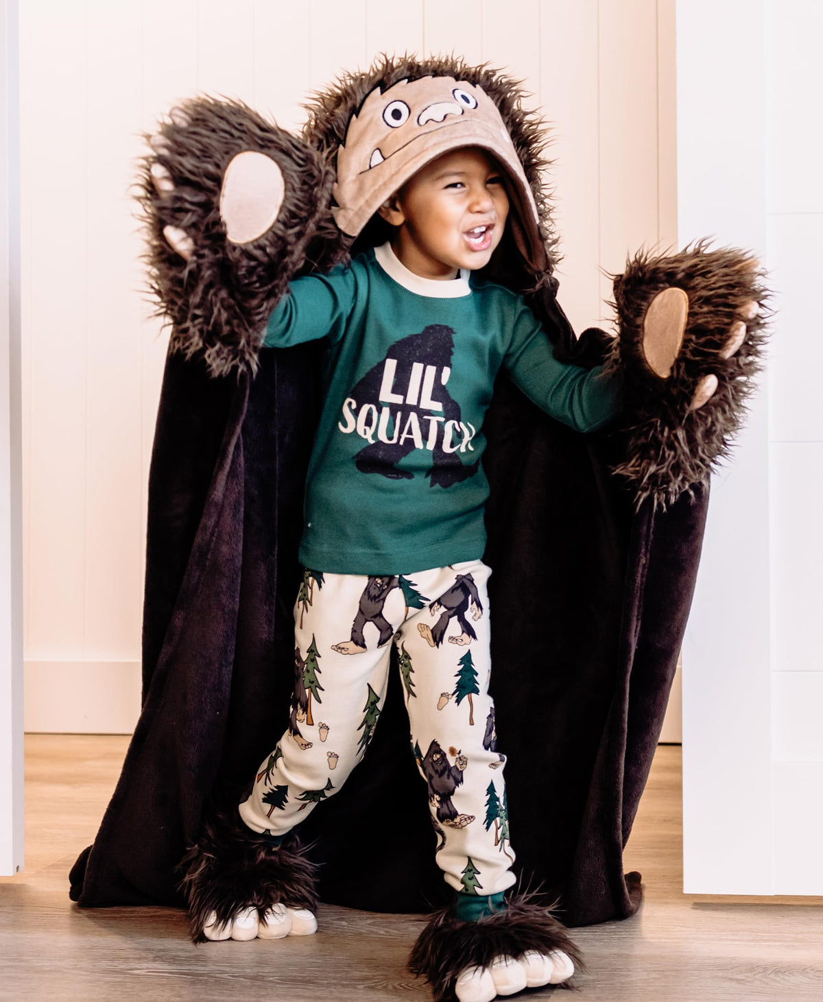 Lazy One Bigfoot travel-friendly hooded blanket keeps kids snug on trips