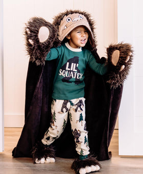 Lazy One Bigfoot travel-friendly hooded blanket keeps kids snug on trips