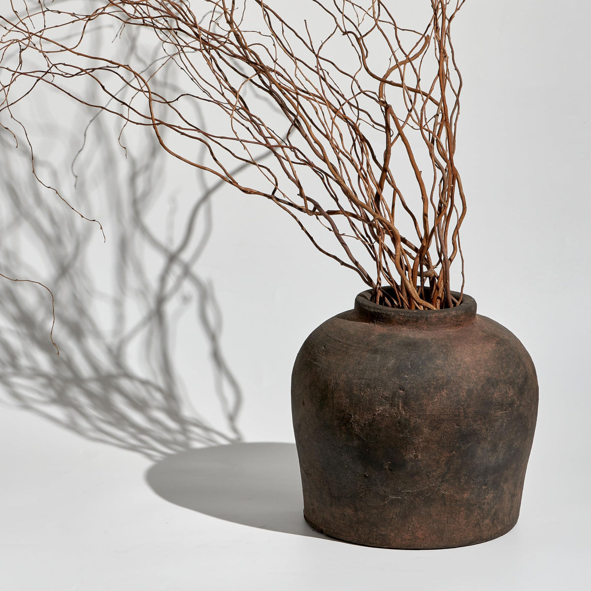 LB2 distressed farmhouse vase in living room setup for elegant decor.