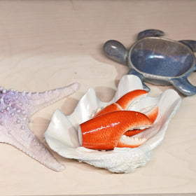 LCdecohome shell bowl acts as a casual candy dish.