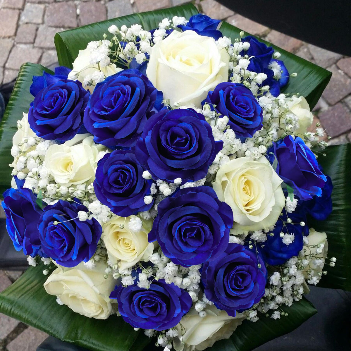 Lcuasc 50-piece artificial roses bulk pack ideal for large events and DIY bouquets.