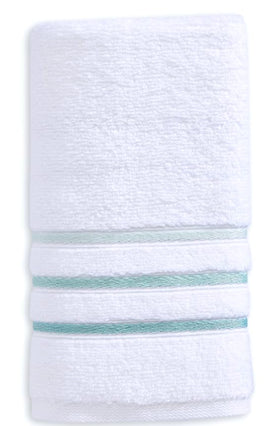 Luxury towels folded neatly on a spa-style display